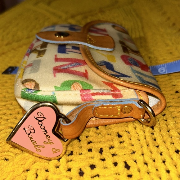 Vintage Dooney & Bourke Coated Canvas Pouch - Picture 8 of 16